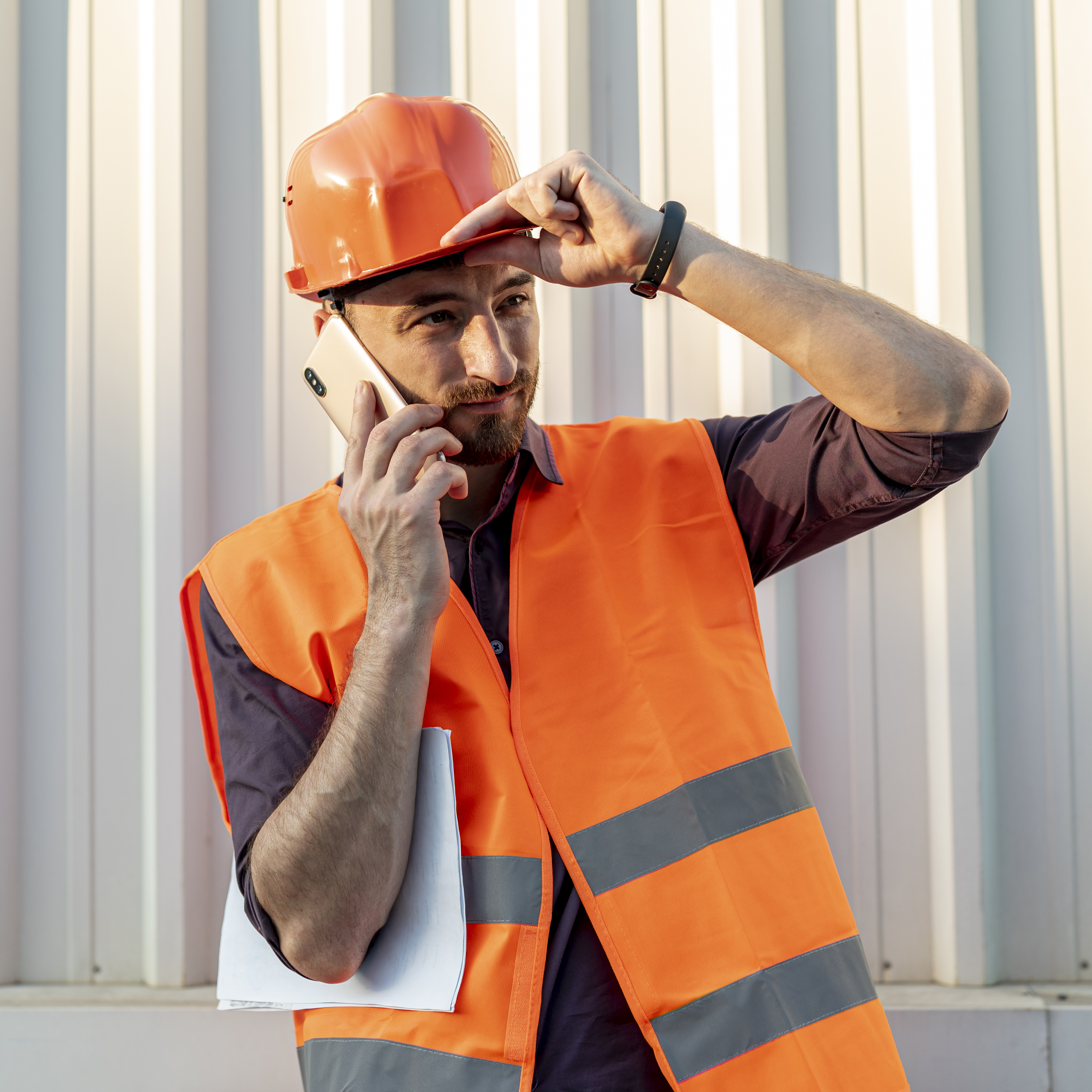 front-view-worker-talking-phone