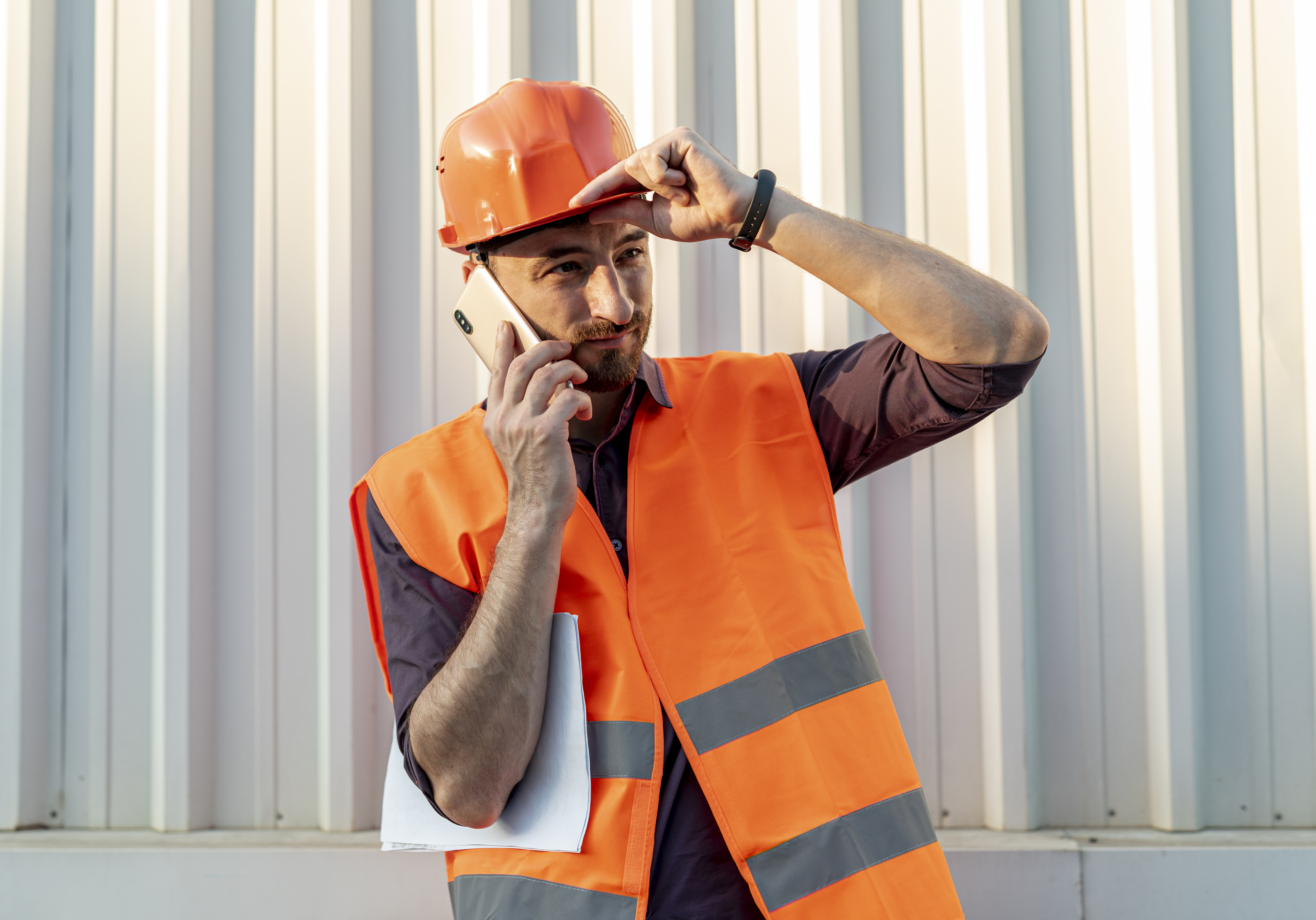 front-view-worker-talking-phone